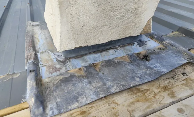 avant travaux bac acier Andon pied cheminée infiltration abergement étanchéité artisan Janselme